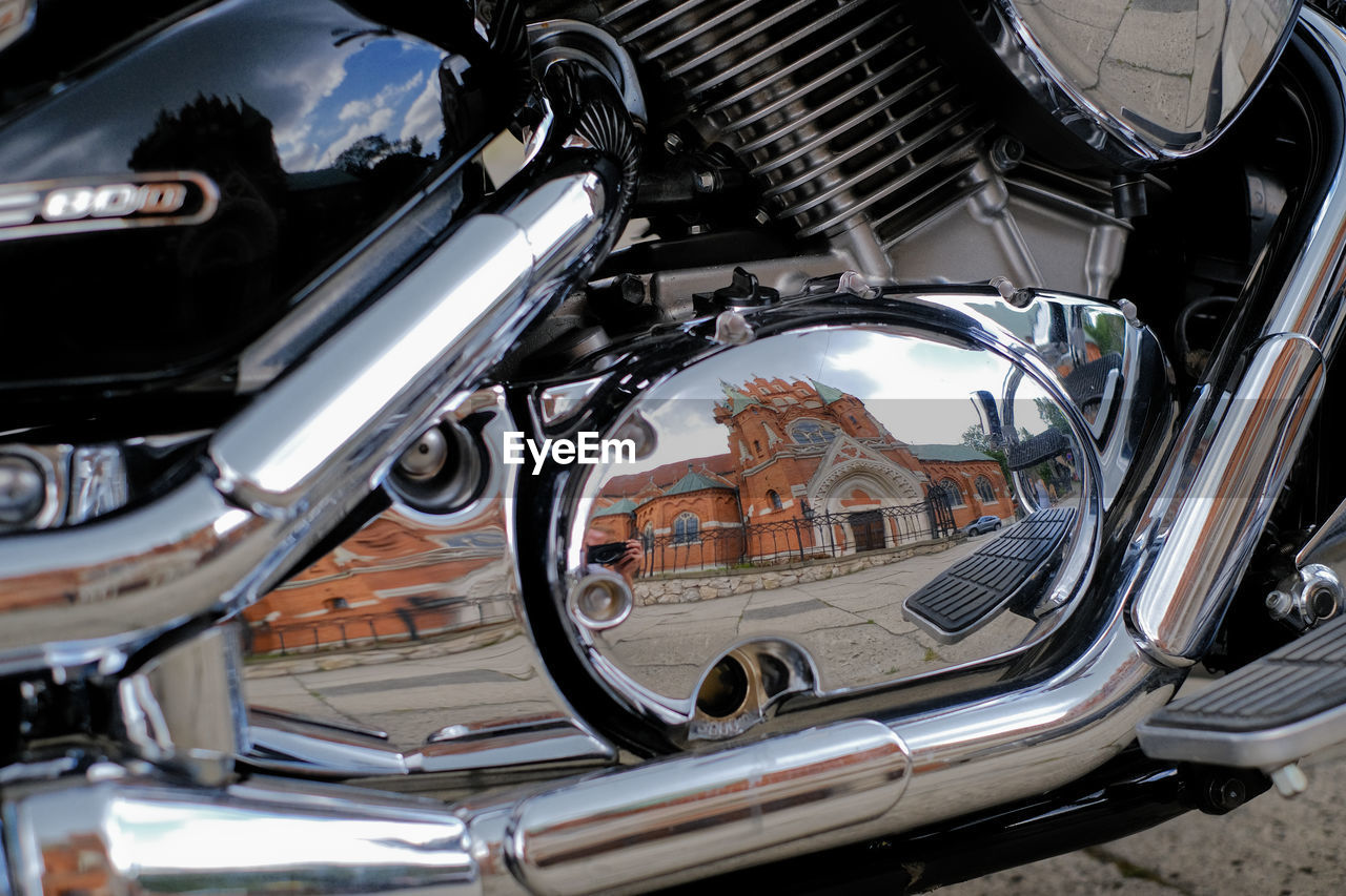 Close-up of reflection at motorcycle