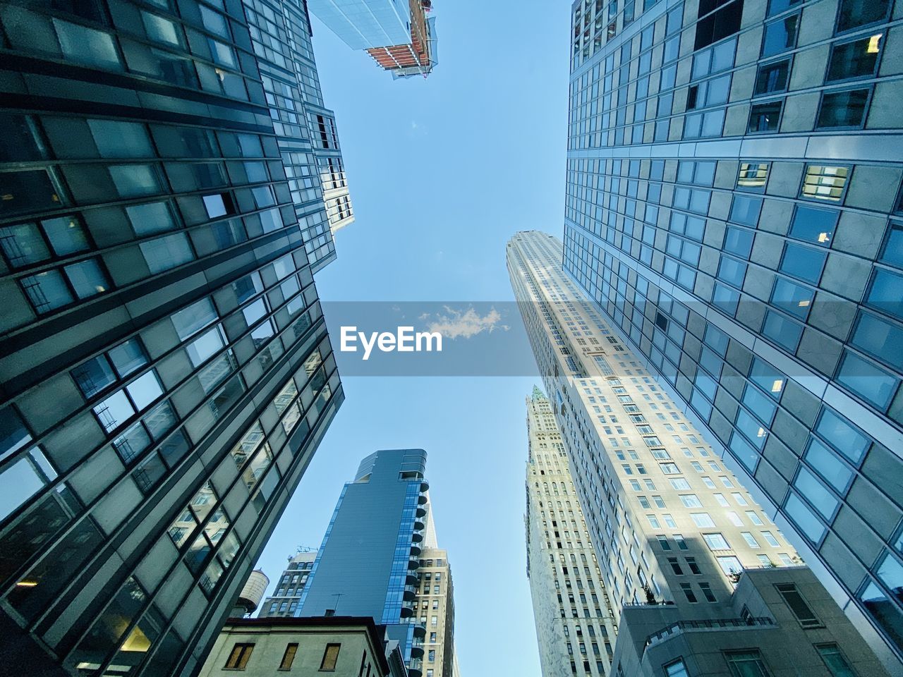 Low angle view of modern buildings against sky