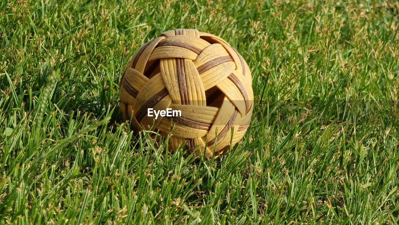 grass, plant, lawn, green, ball, nature, field, high angle view, no people, land, day, sports, outdoors, soccer, sunlight, growth