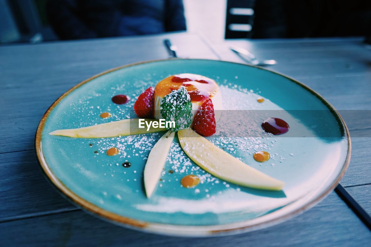 Close-up of custard in plate on table