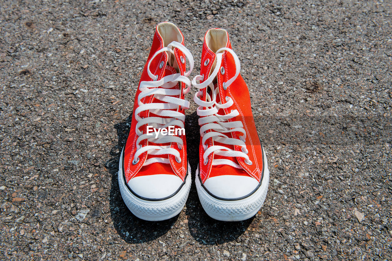 High angle view of shoes on street