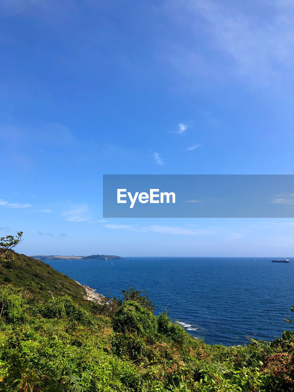 SCENIC VIEW OF BLUE SEA AGAINST SKY