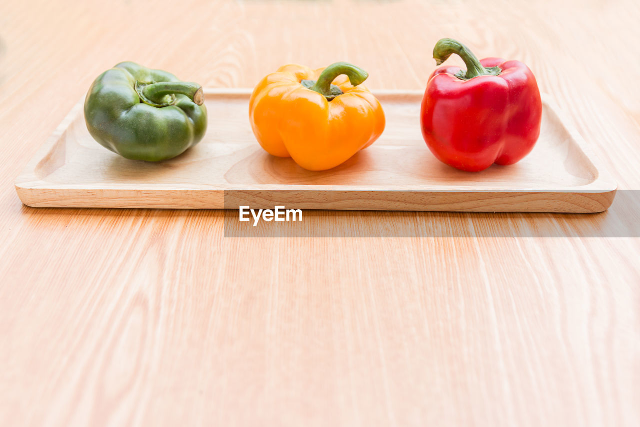 Close-up of bell peppers on cutting board