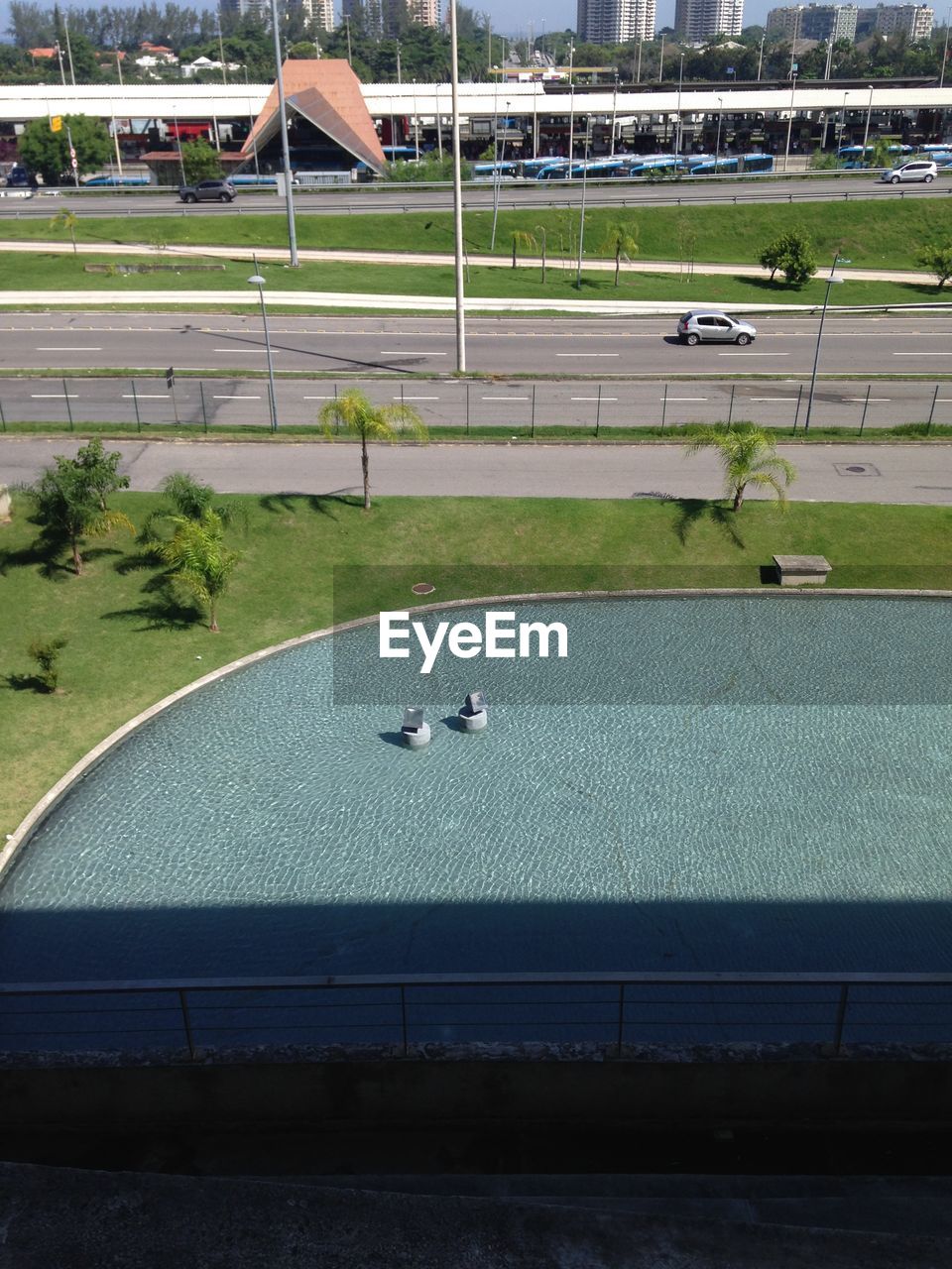 HIGH ANGLE VIEW OF SOCCER FIELD AGAINST SKY