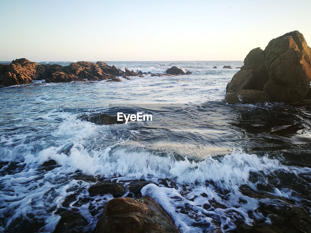 Scenic view of sea against clear sky