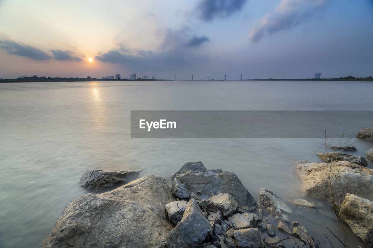 Scenic view of sea against sky during sunset