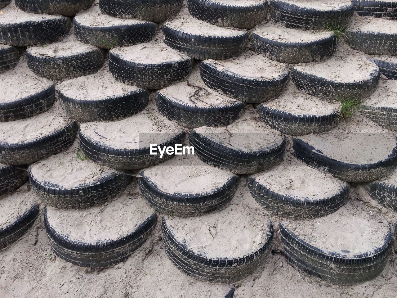 HIGH ANGLE VIEW OF STACK OF OBJECTS