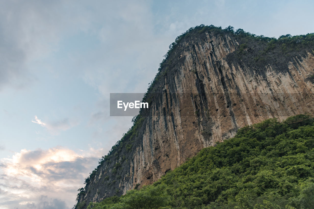 Low angle view of mountain against sky