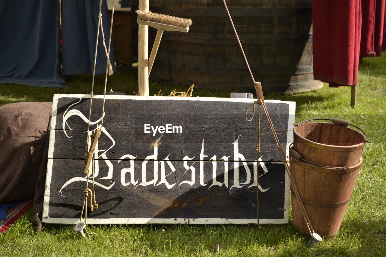 CLOSE-UP OF CLOTHES HANGING ON ROPE AT YARD