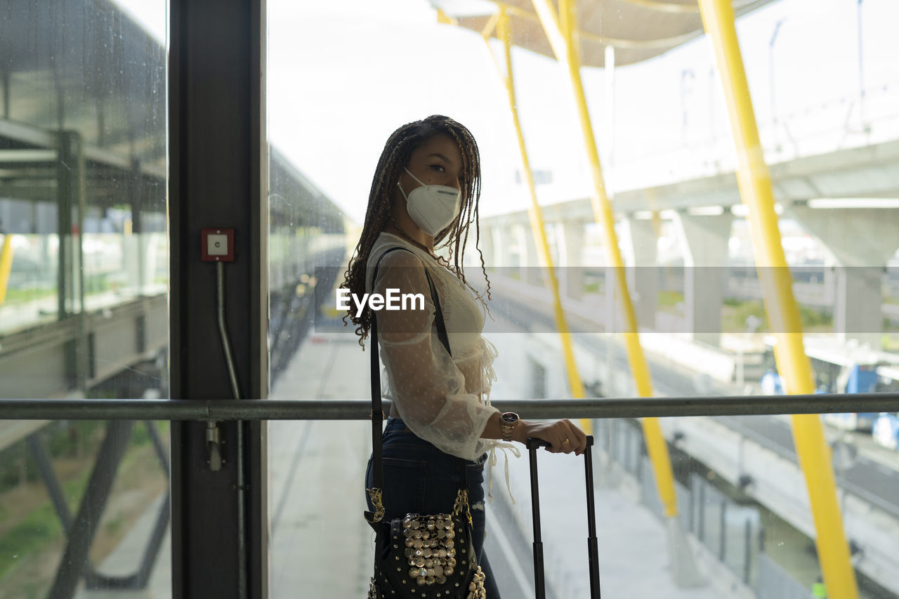 Tourist at the airport waiting to board