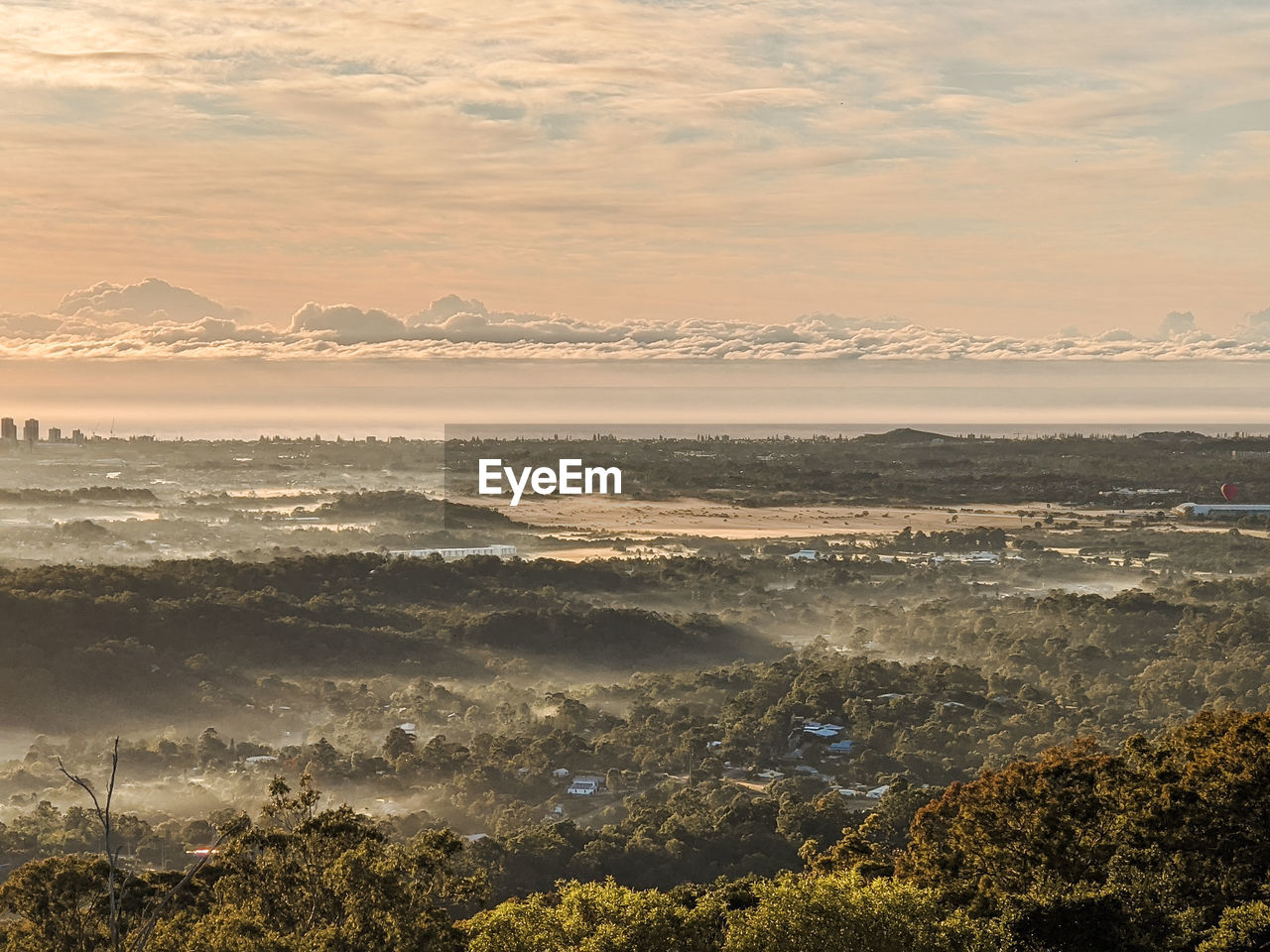 High angle view of cityscape against sky during sunset