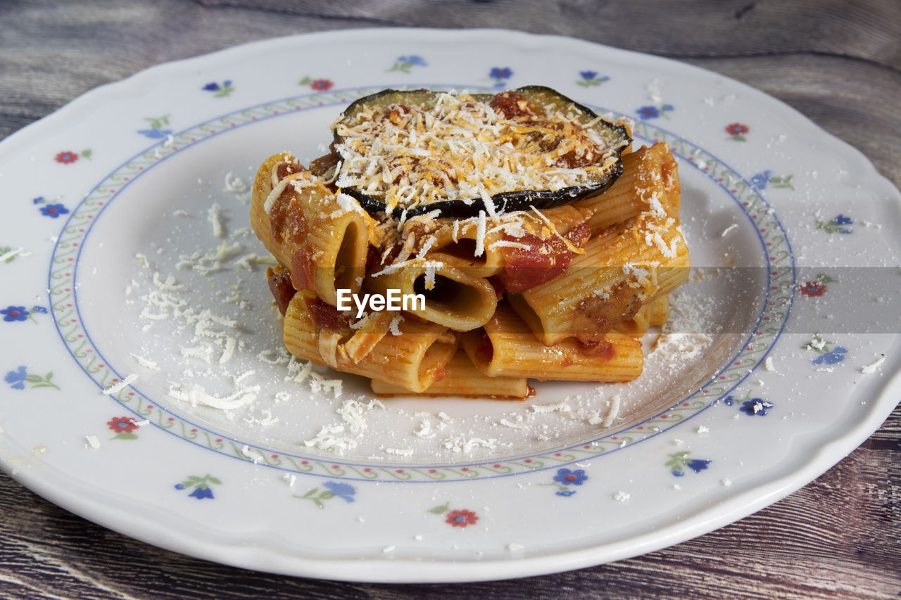Pasta alla norma with aubergines and sheep ricotta