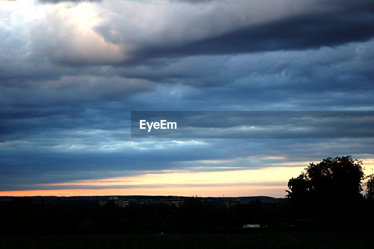 SILHOUETTE LANDSCAPE AGAINST SKY DURING SUNSET