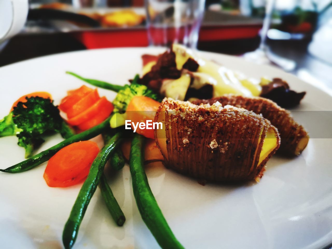 CLOSE-UP OF MEAL SERVED ON TABLE