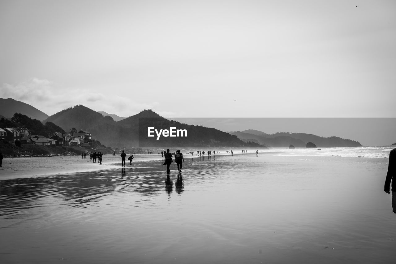GROUP OF PEOPLE ON BEACH
