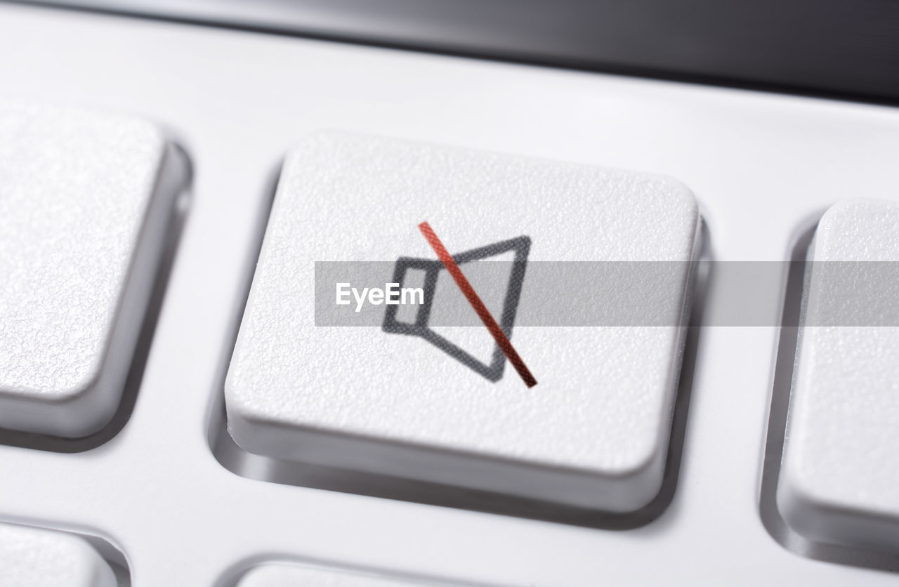 Close-up icon on button of computer keyboard
