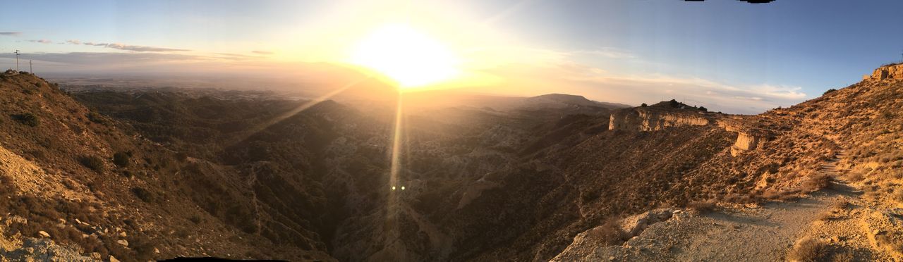 Panoramic view of landscape against sky during sunset