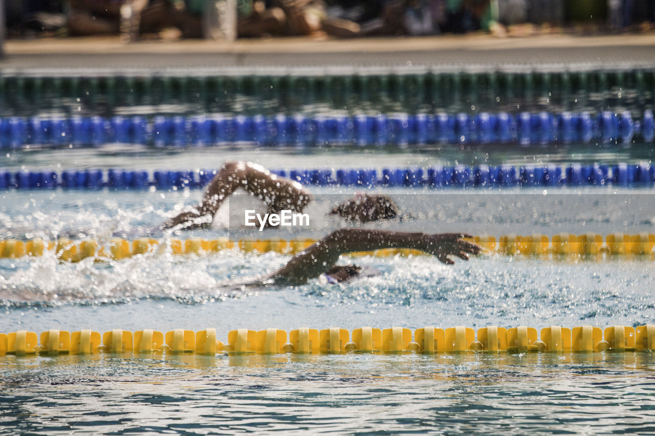 People swimming in pool