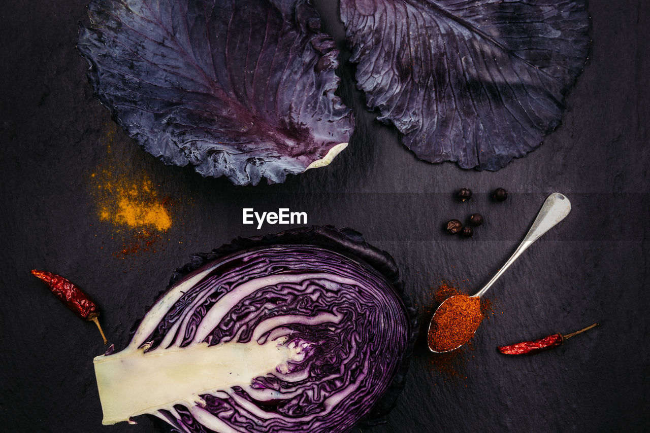 High angle view of red cabbage on stone