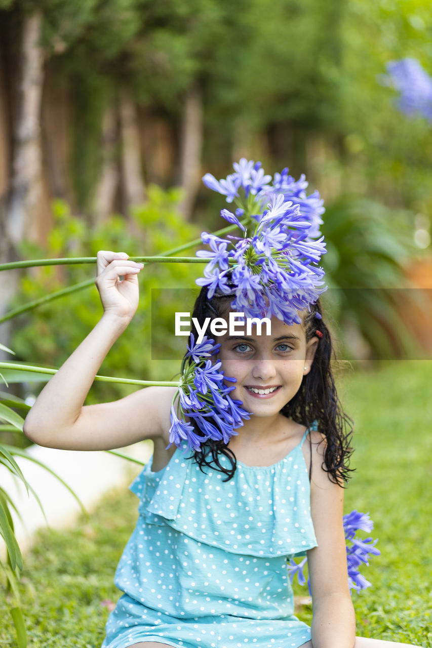 Portrait of a little girl on a garden