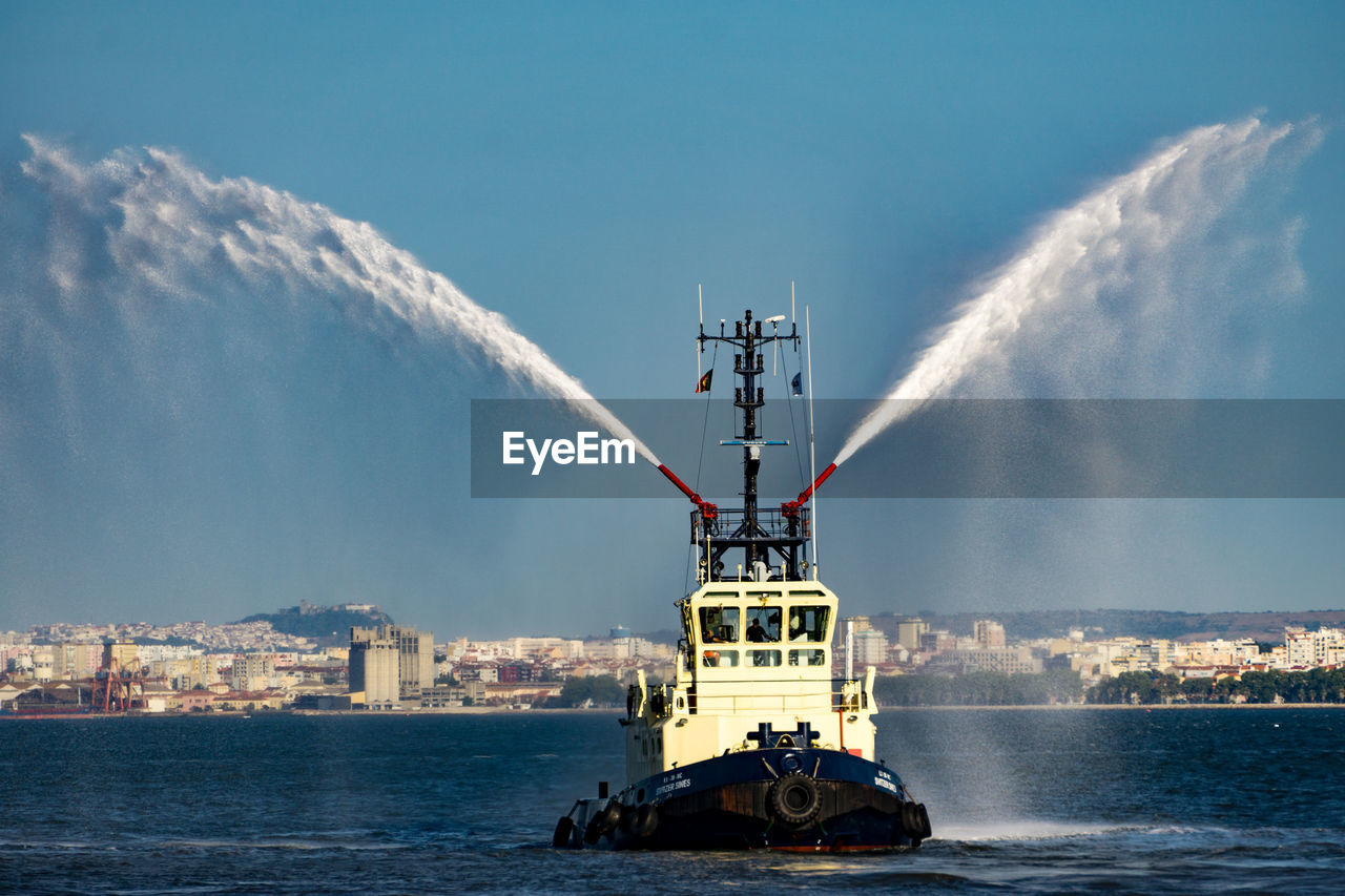 NAUTICAL VESSEL IN SEA AGAINST SKY