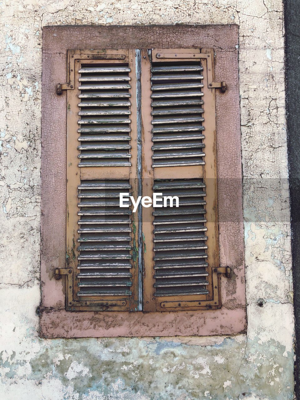 Closed window of old building