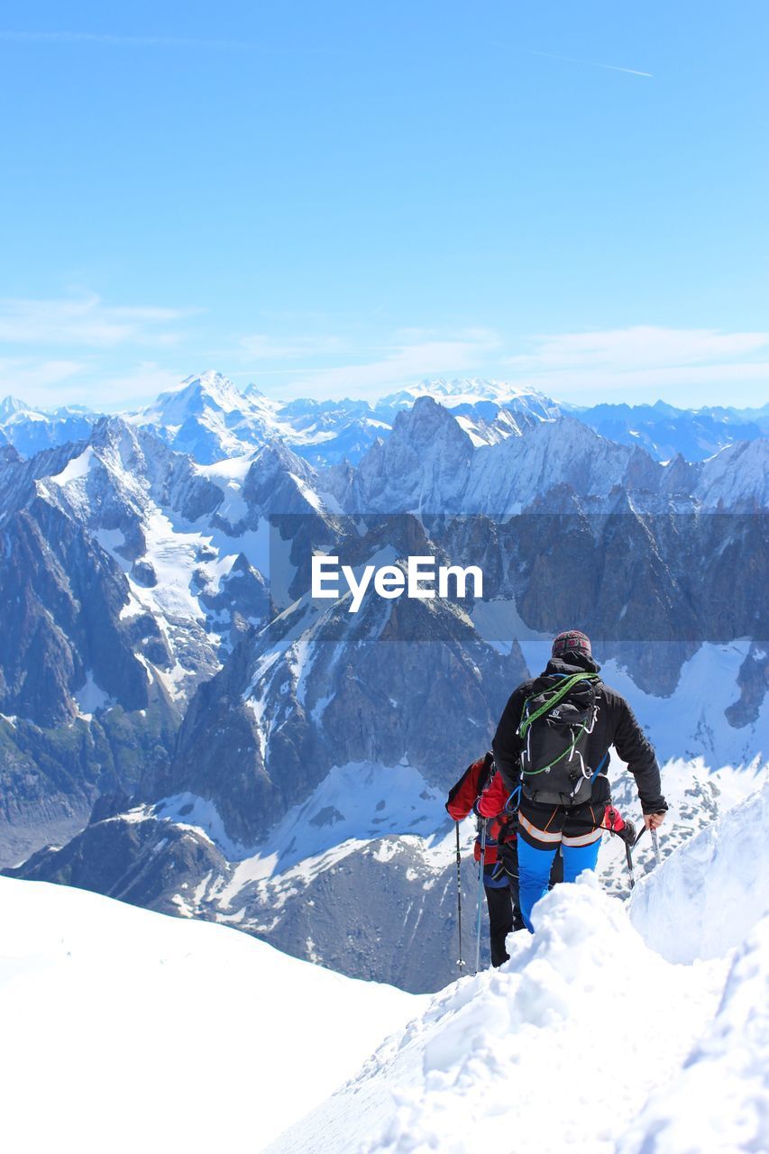 SCENIC VIEW OF SNOW COVERED MOUNTAINS