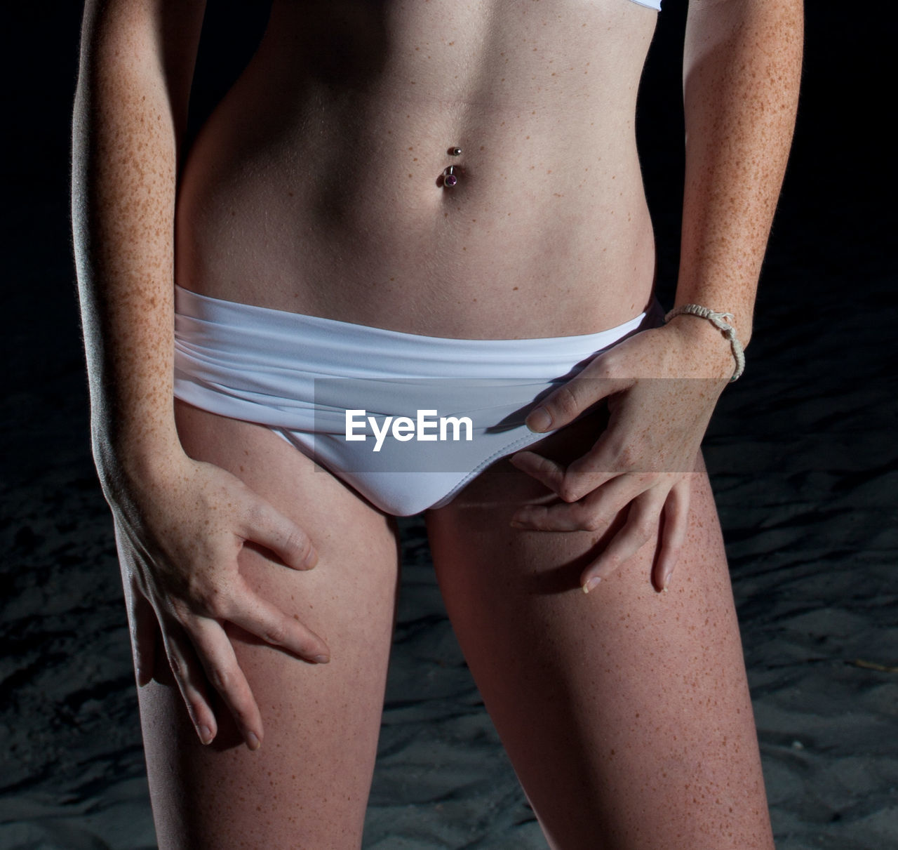 Midsection of woman wearing panty