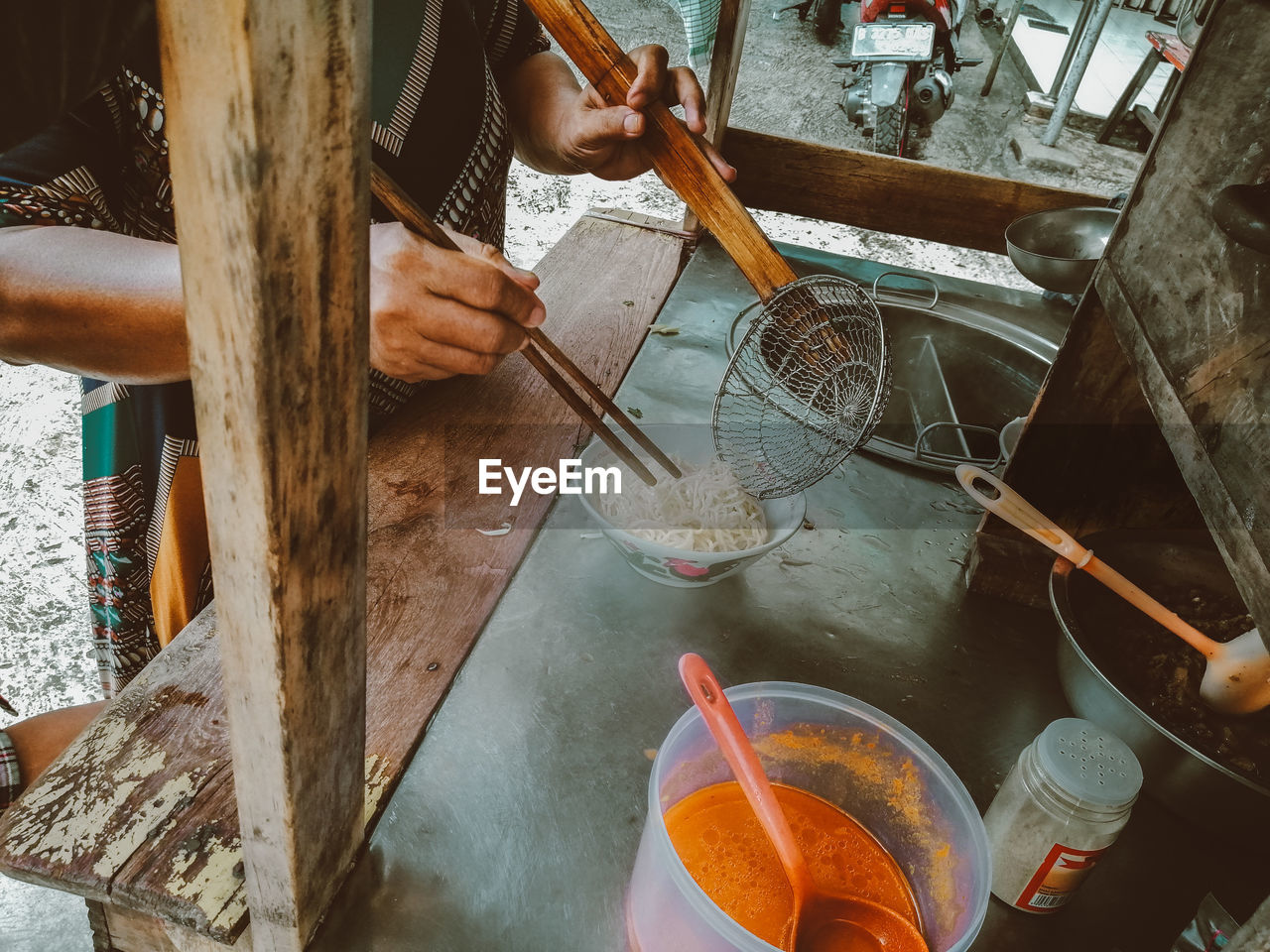 High angle view of man preparing food on table