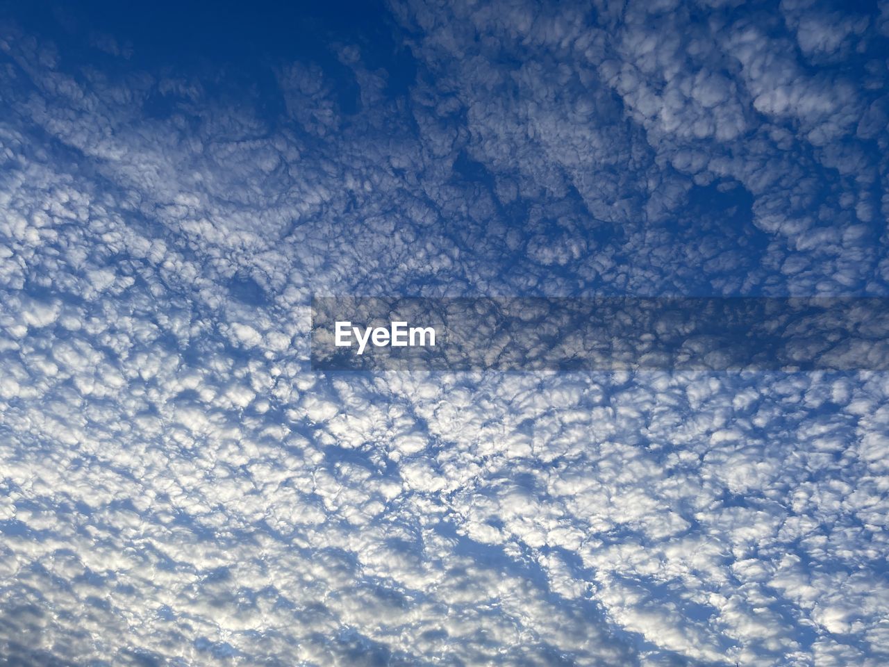 sky, cloud, horizon, backgrounds, blue, no people, nature, sunlight, full frame, beauty in nature, scenics - nature, winter, snow, day, white, wave, pattern, outdoors, cold temperature, environment, low angle view, textured, tranquility, reflection, idyllic, azure