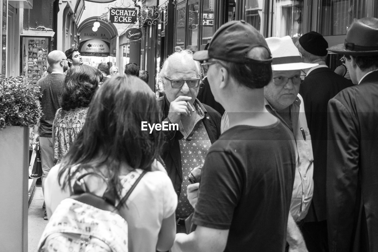 PEOPLE WALKING ON STREET