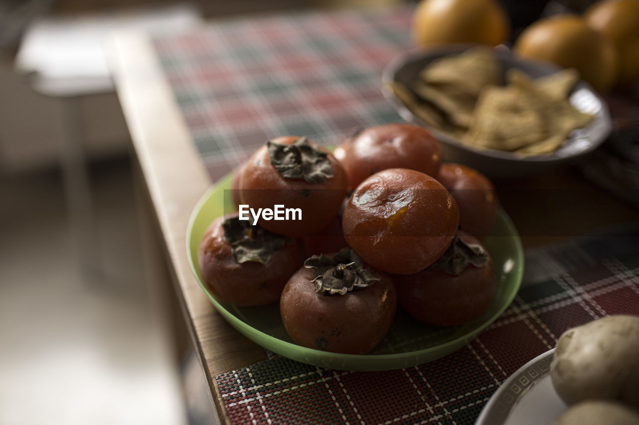 food, food and drink, healthy eating, fruit, freshness, produce, no people, wellbeing, sweetness, dessert, indoors, bowl, table, dish, tablecloth, vegetable, checked pattern, cuisine, still life, meal, sweet food, household equipment, chocolate