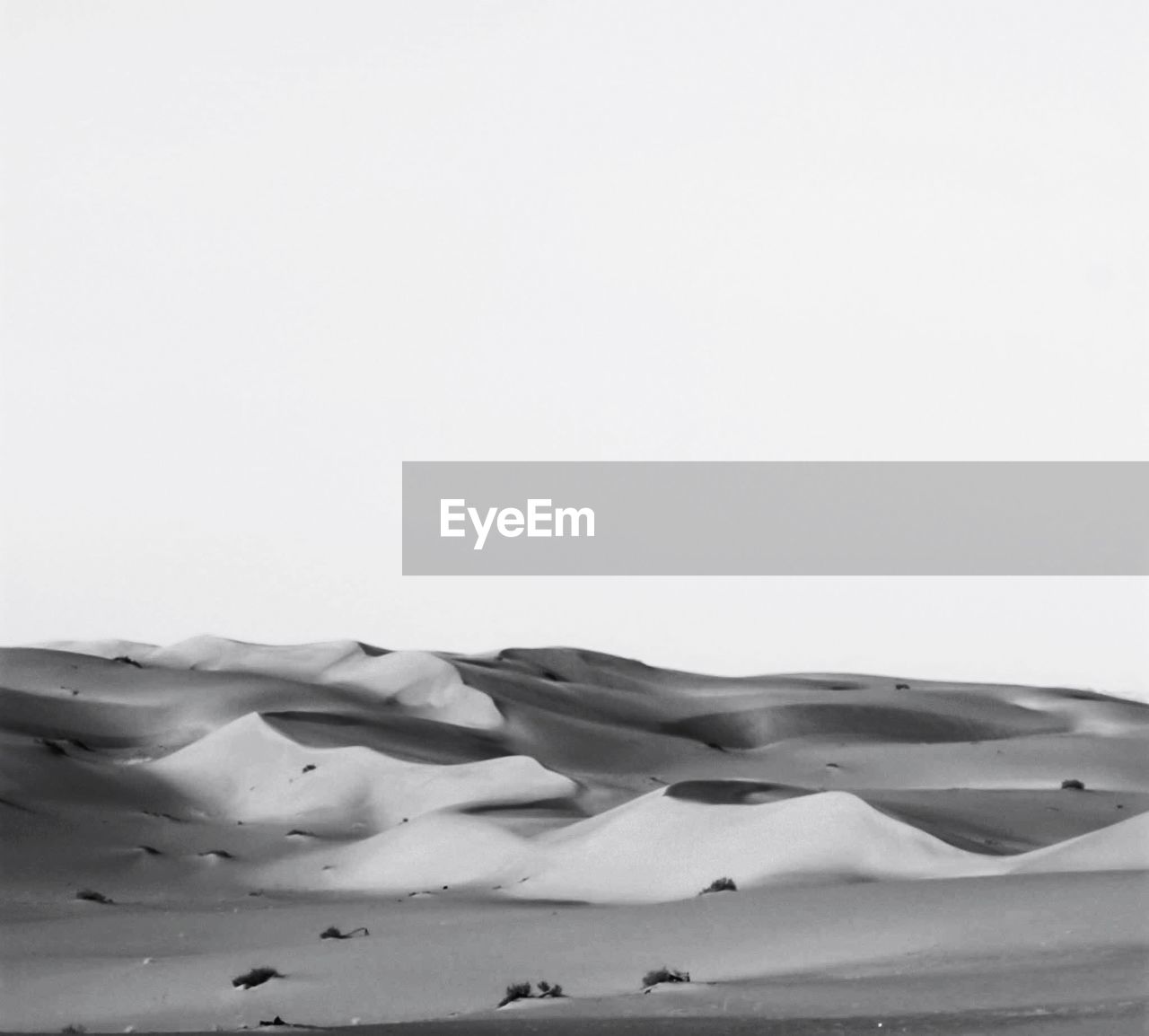 SNOW COVERED LAND AGAINST SKY