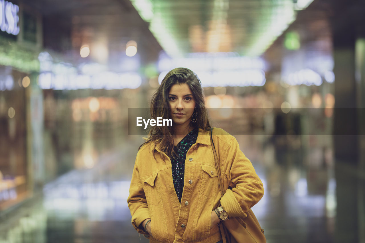 Portrait of young woman indoors