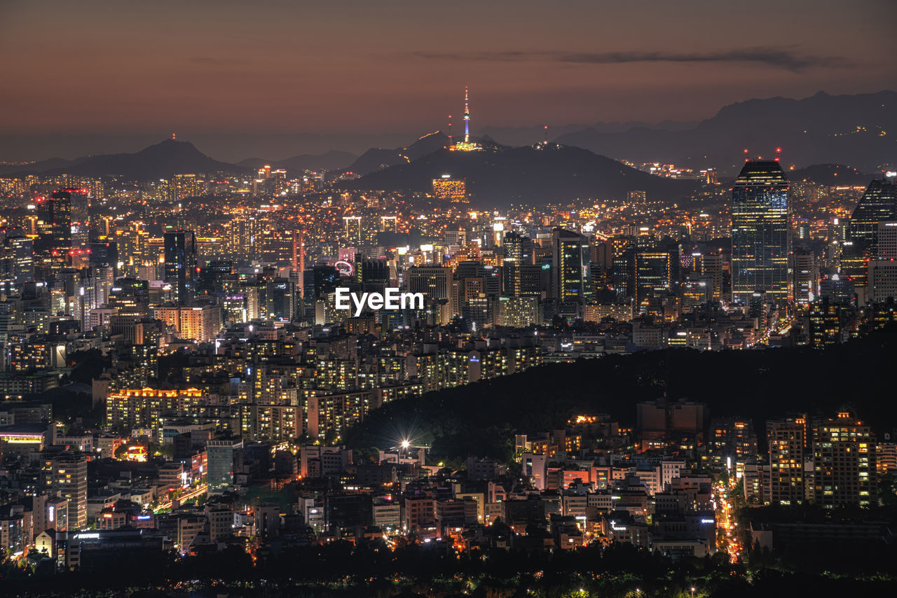 Illuminated cityscape at night