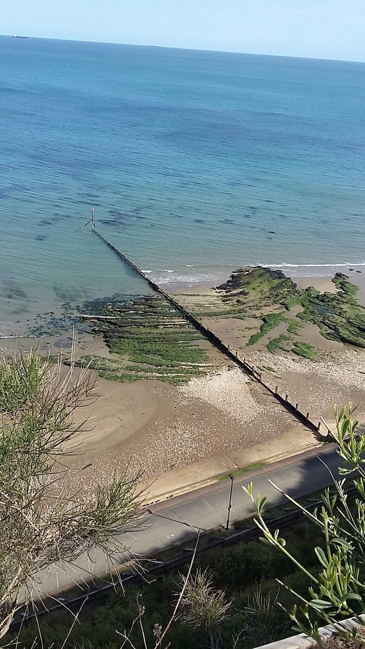 High angle view of breakwater on beach