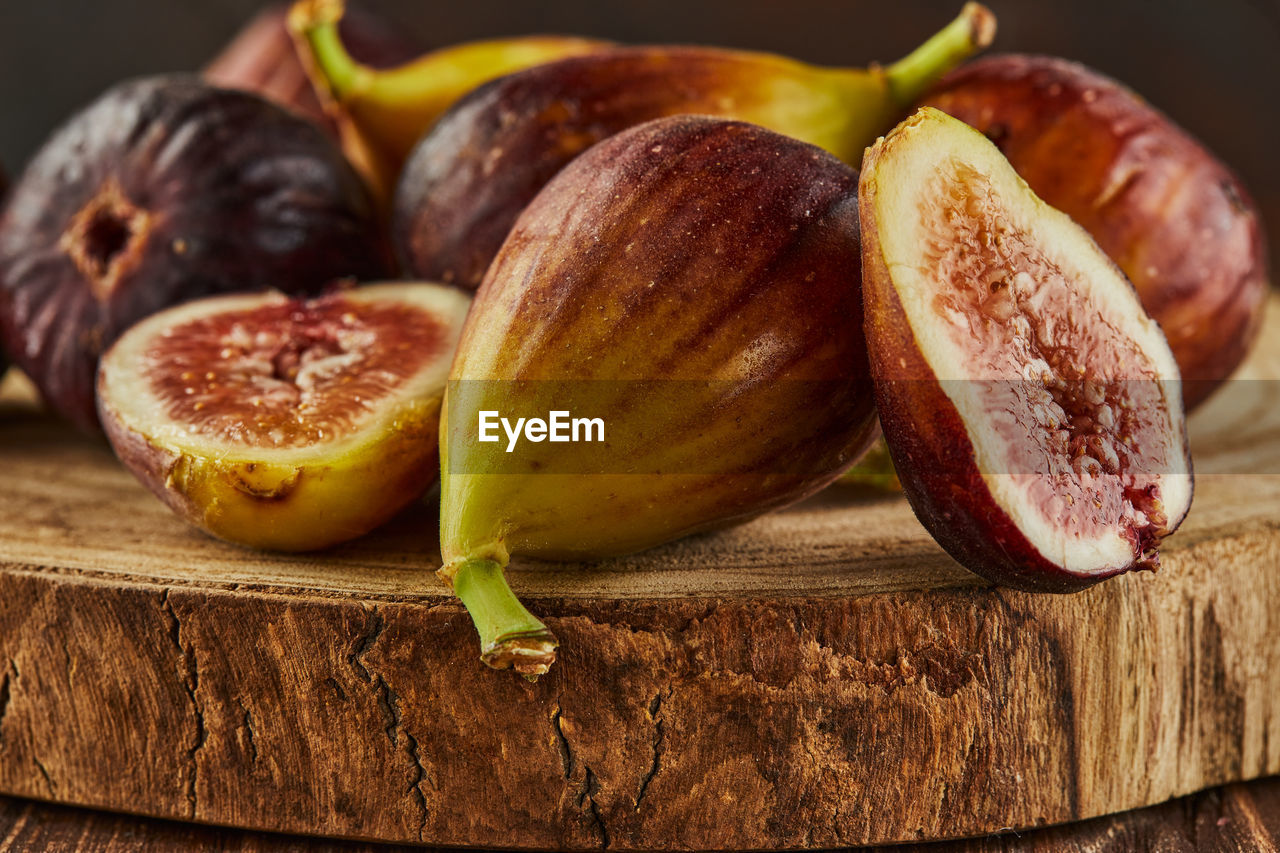 close-up of fruits on wooden table