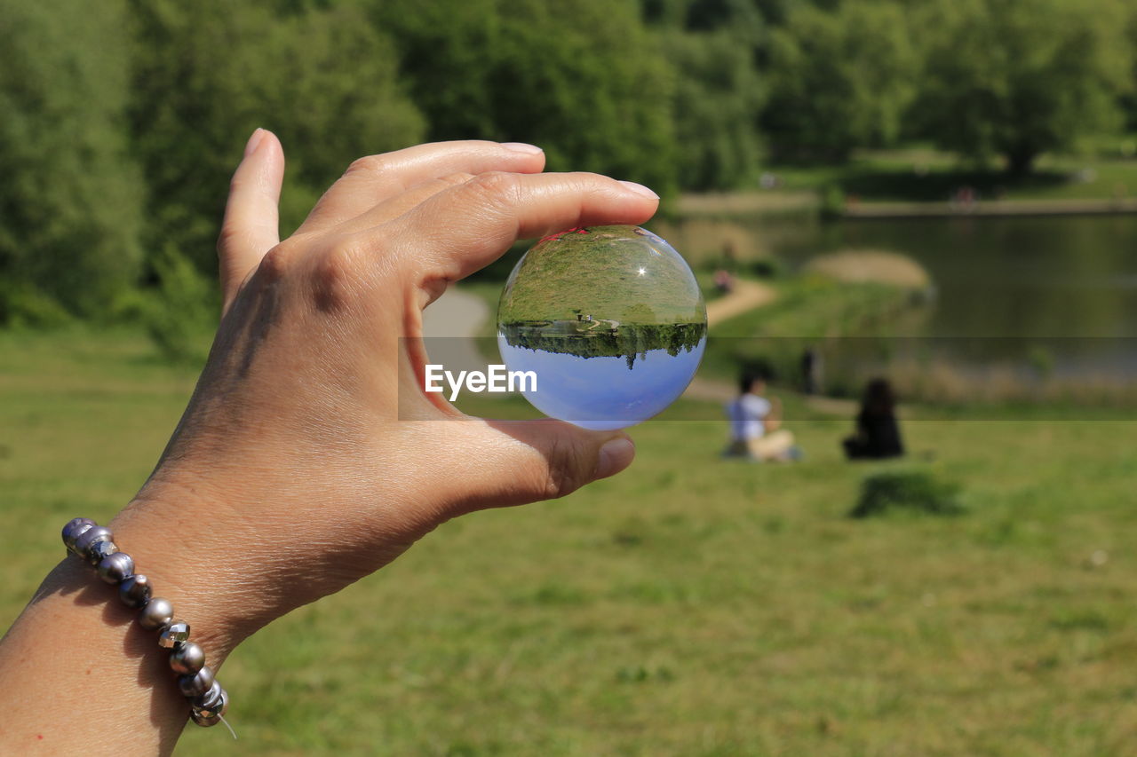 Woman holding crystal ball 