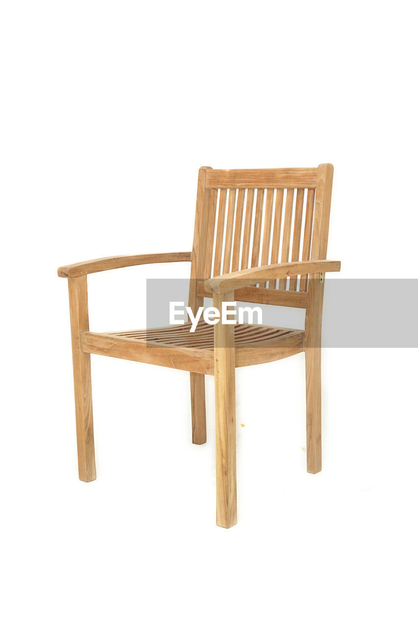 VIEW OF WOODEN CHAIRS AGAINST WHITE BACKGROUND