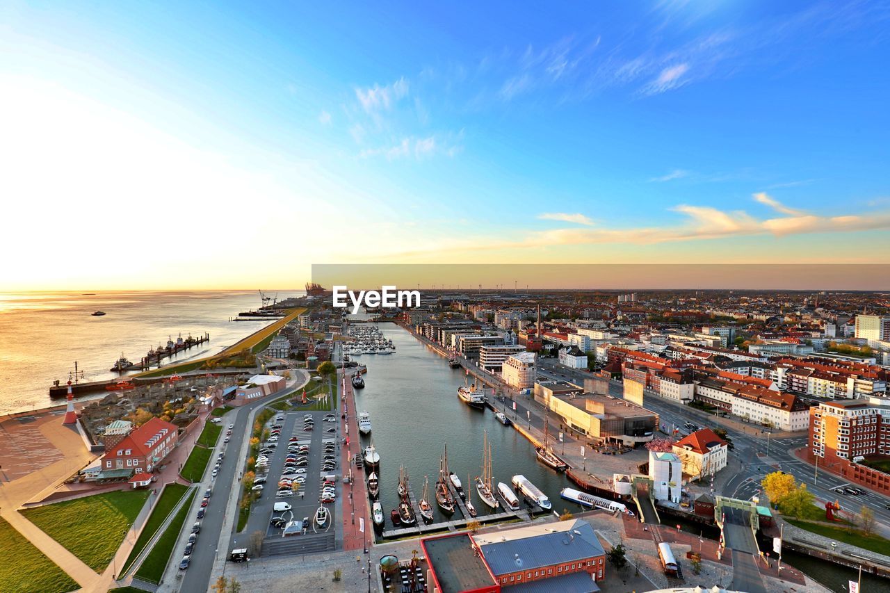 High angle view of cityscape against sky during sunset