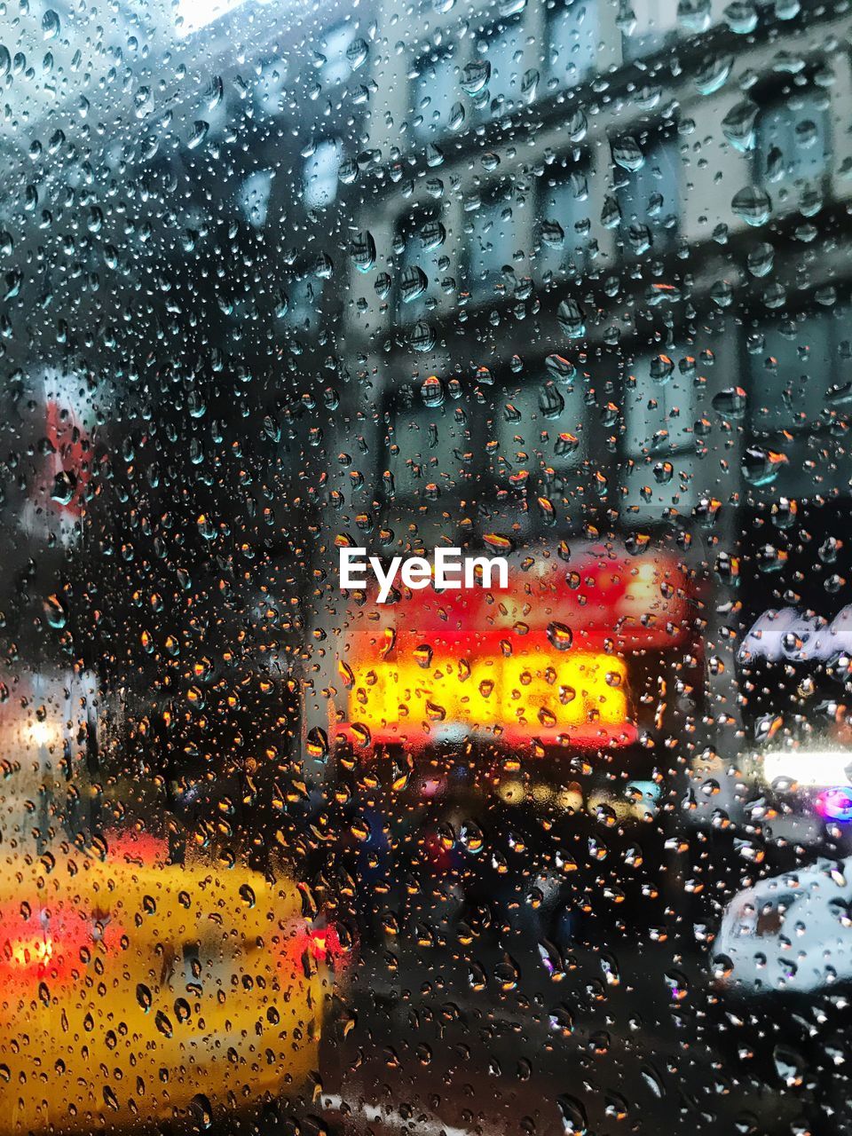 CLOSE-UP OF WET CAR WINDOW