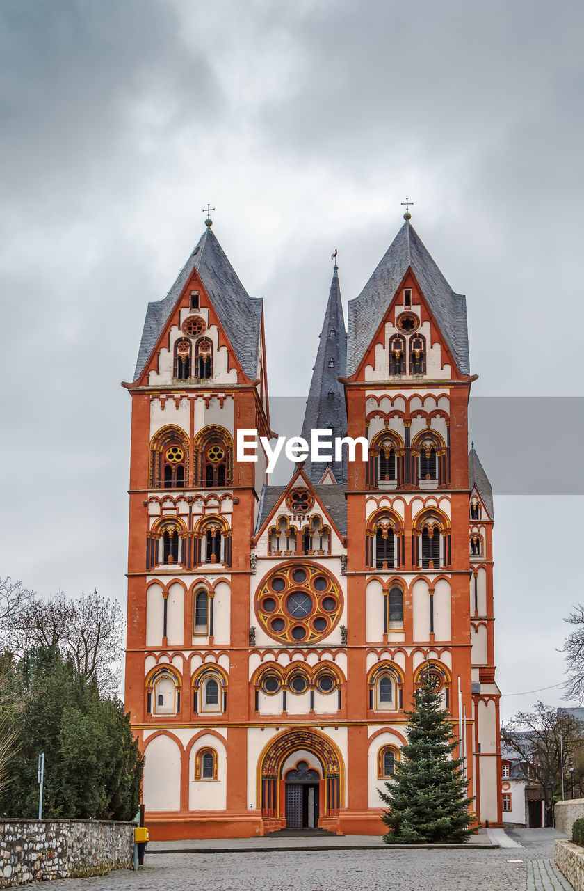 FACADE OF CHURCH AGAINST SKY