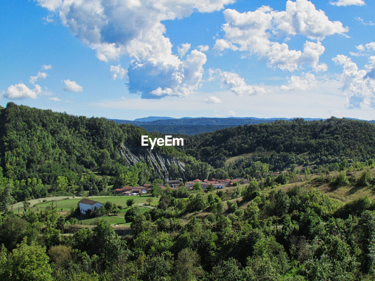 SCENIC VIEW OF LANDSCAPE AND MOUNTAINS AGAINST SKY