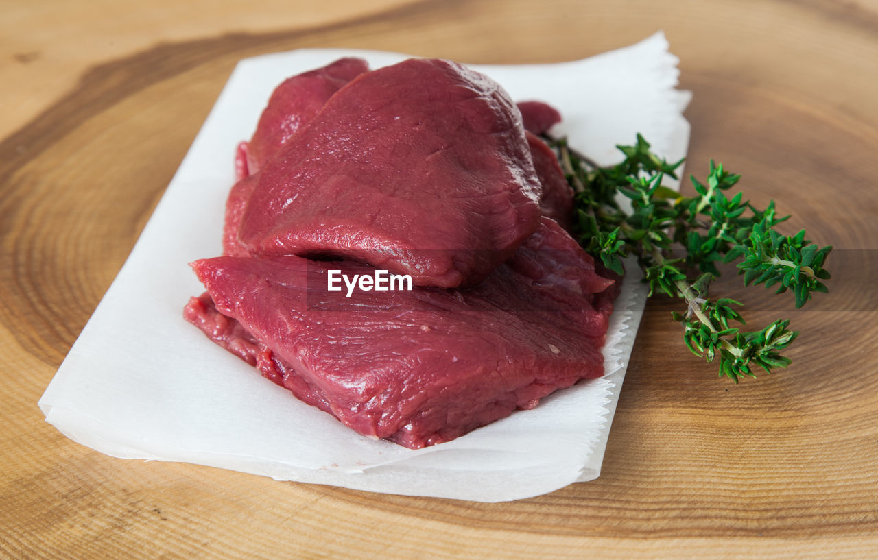 Close-up of meat on table