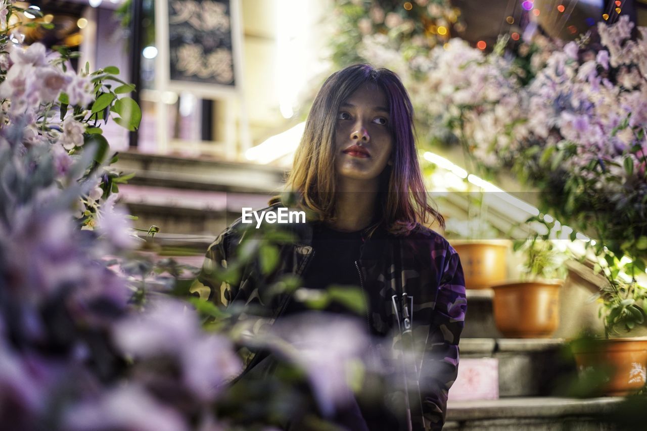 Portrait of beautiful young woman at home