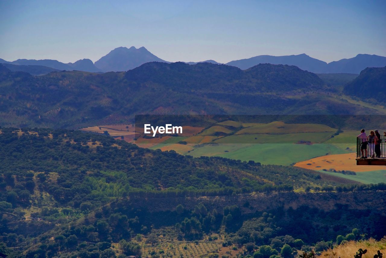 SCENIC VIEW OF MOUNTAINS AGAINST CLEAR SKY