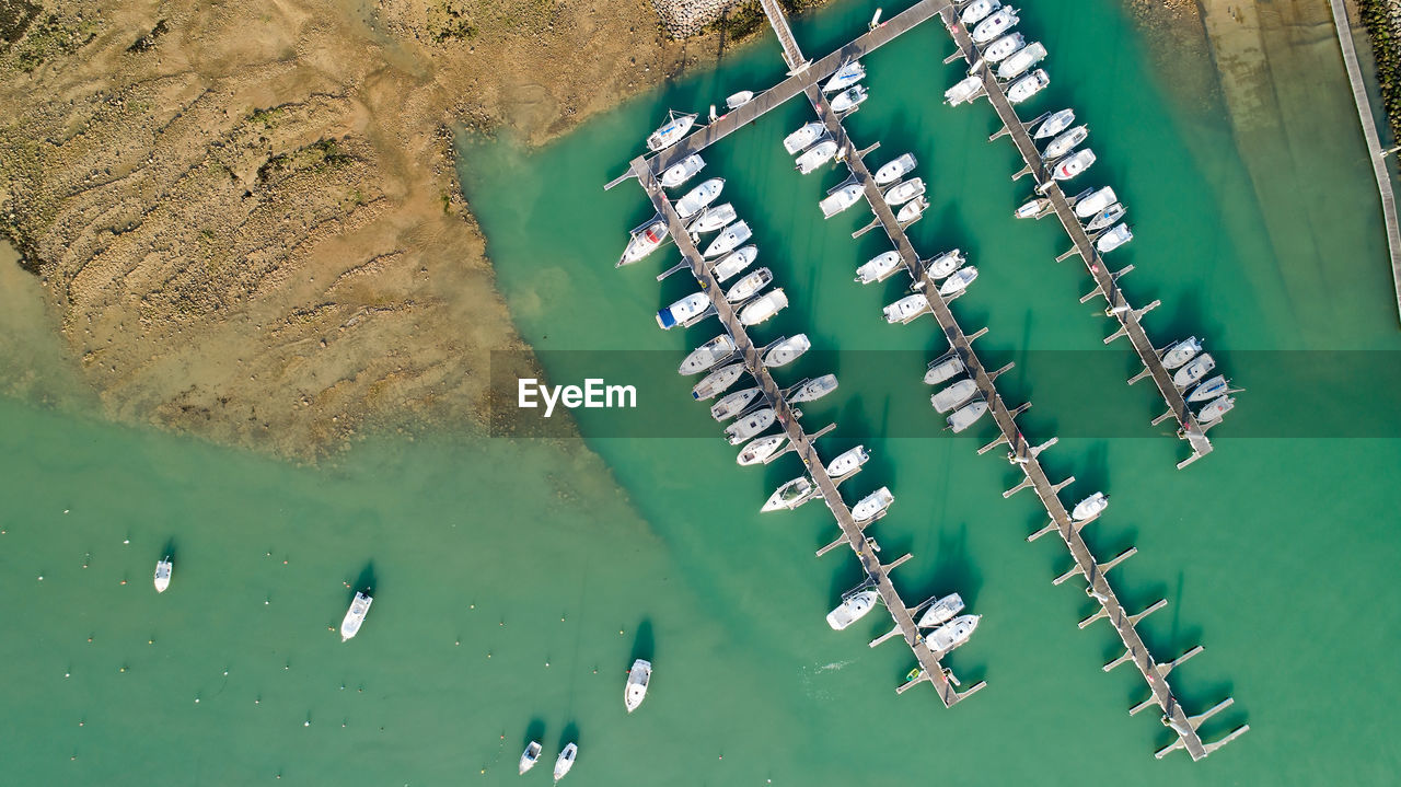 Aerial view of boats moored at harbor