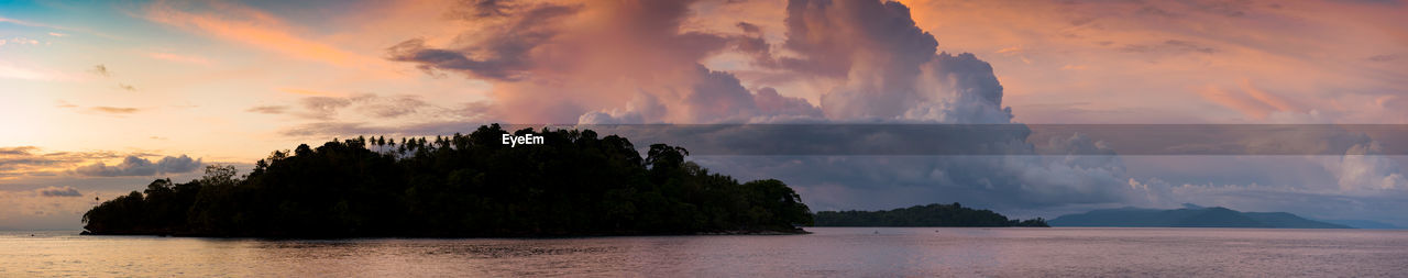 Panoramic view of sea against sky during sunset