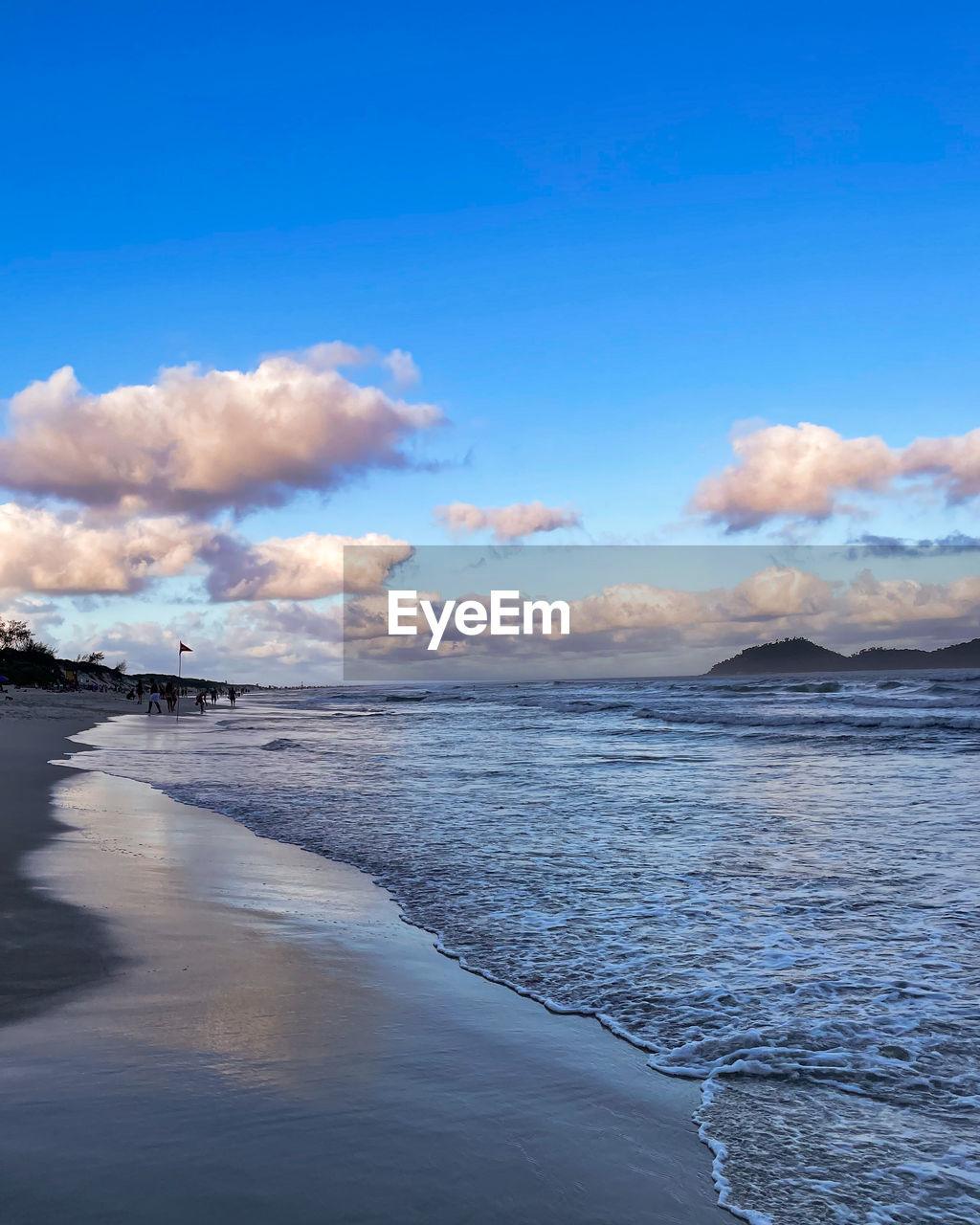 sky, water, sea, land, cloud, scenics - nature, beauty in nature, beach, ocean, shore, horizon, nature, wave, body of water, blue, coast, environment, wind wave, travel destinations, landscape, travel, tranquility, no people, outdoors, motion, tranquil scene, sand, dusk, tourism, sunset, coastline, reflection, holiday, day, trip, vacation, water sports, seascape, non-urban scene, idyllic, bay, sports