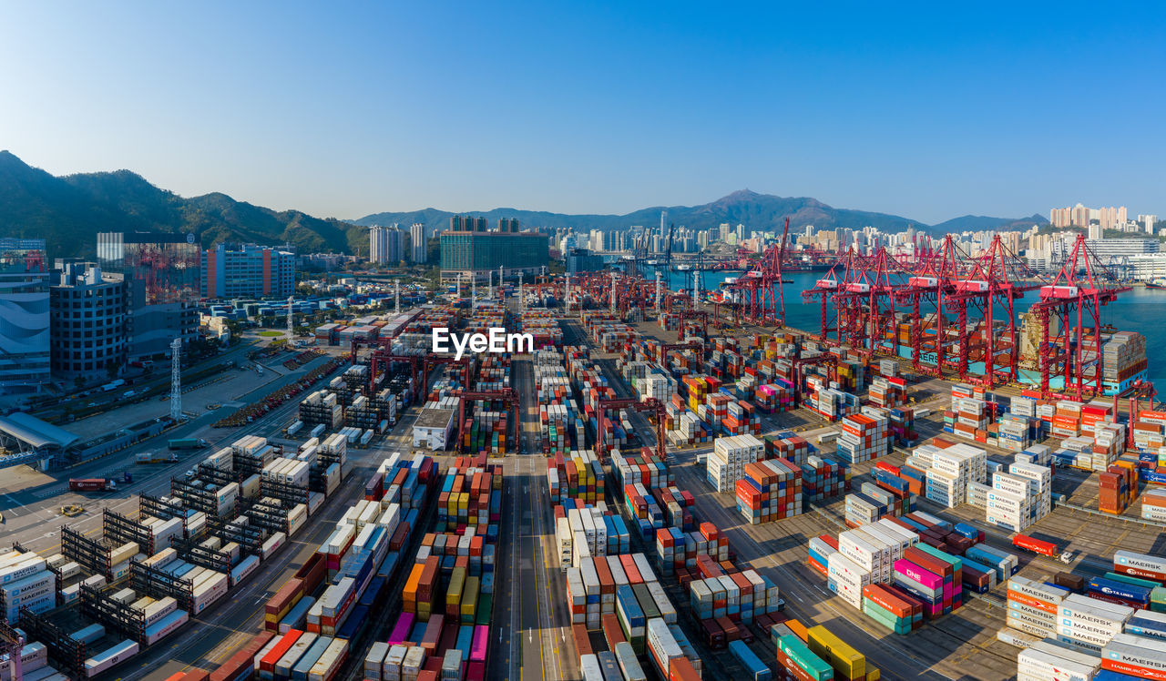 HIGH ANGLE VIEW OF CITYSCAPE AT HARBOR